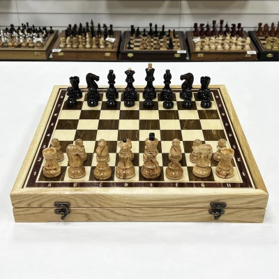 Шахматы в ларце из граба с фигурами из карельской березы